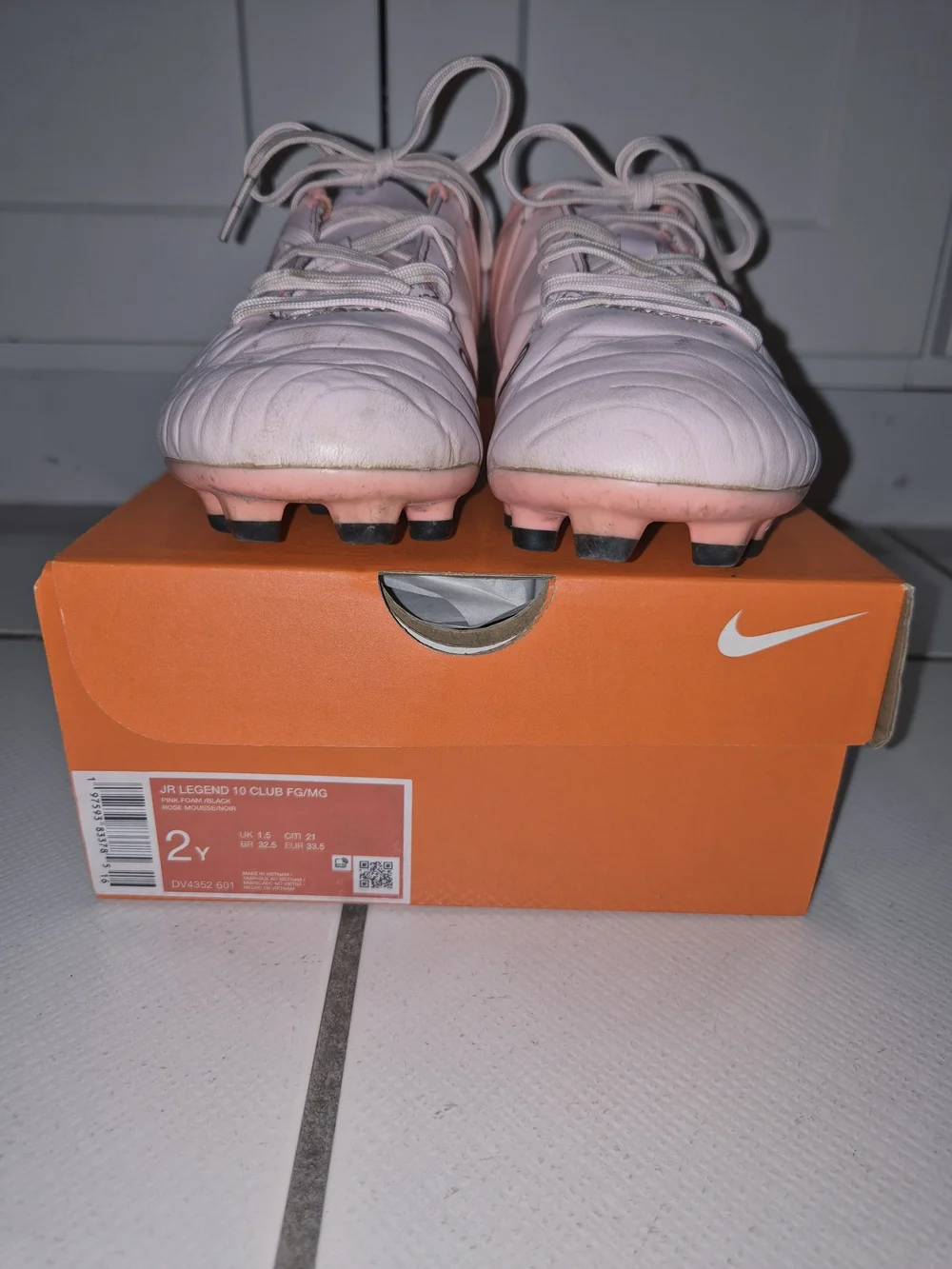 Nike Pink Soccer Cleats with Black Swoosh
